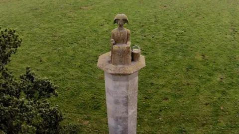 Statue of Maud Heath across the Causeway