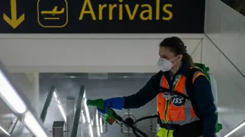 Getty Images A woman at Gatwick Airport