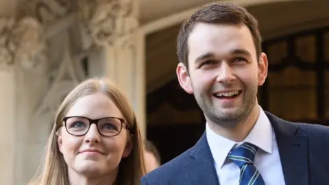 Getty Images Daniel McArthur and his wife Amy