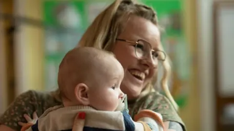 Jon Pountney / Mind Cymru Bethanie holding her baby