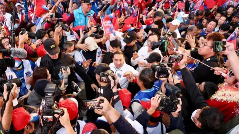 EPA Hou You-yi in the middle of crowd greets supporters during a campaign rally in Kaohsiung city on 7 January 2024