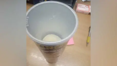 Waveney Foodbank/Facebook Half-eaten tin of Pringles