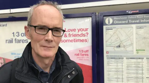 John outside Oxford Rd station