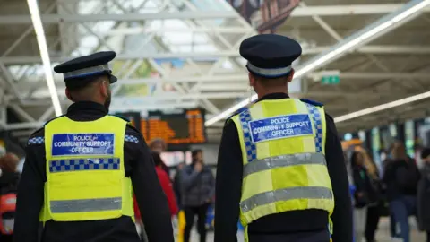 West Yorkshire Combined Authority Two PCSOs patrolling bus station