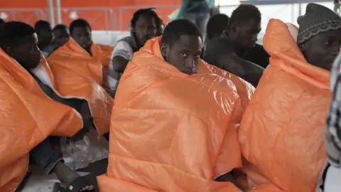 Getty Images Rescued African migrants arriving in Italy in 2016