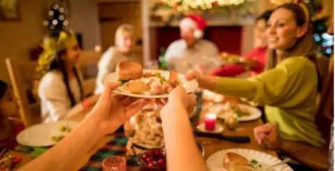 Getty Images Pre-arranged Christmas bubbles can still go ahead