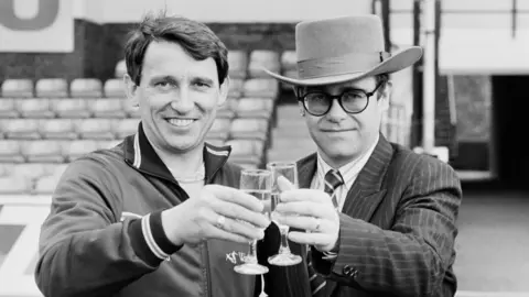 Getty Images Elton John with Graham Taylor in the 1980s