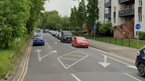 Google Bridge Road in Maidenhead, with cars driving along the road