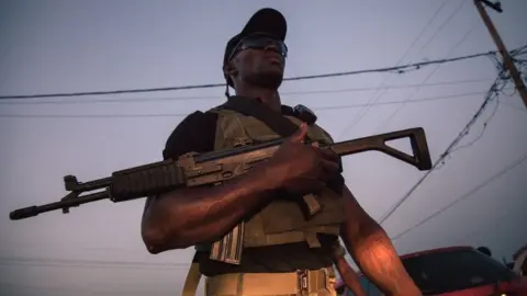 Getty Images Soldiers of the 21st Motorized Infantry Brigade patrol in the streets of Buea, South-West Region of Cameroon on April 26, 2018.