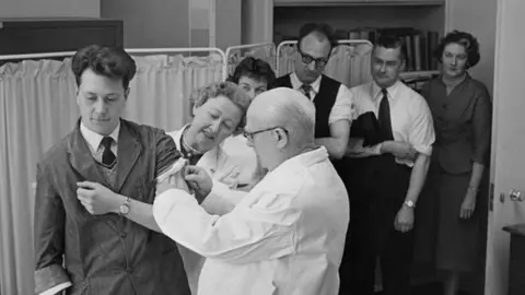 PA Media Vaccinations in London during an outbreak in 1959