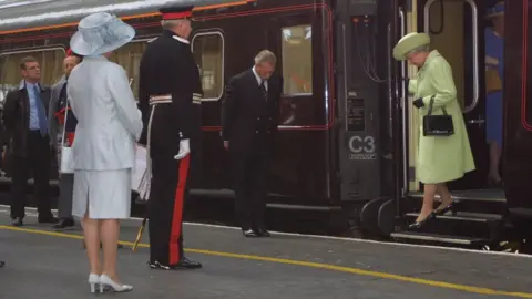 Getty Images The Queen arriving in Preston in 2003