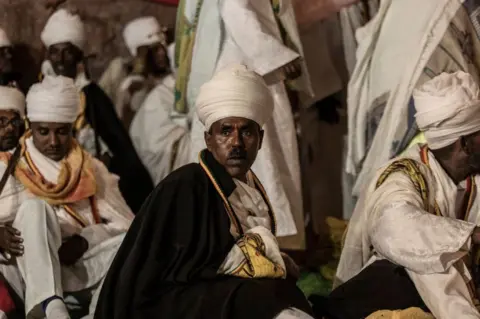 AFP An Ethiopian Orthodox priest looks on in Lalibela, Ethiopia - Friday 6 January 2023