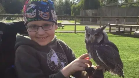 Alex Goodwin/ Twitter Alex with an owl