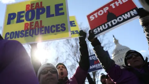 Reuters Federal air traffic controller union members protest the partial U.S. federal government shutdown in a rally at the U.S. Capitol in Washington, U.S. January 10, 2019.