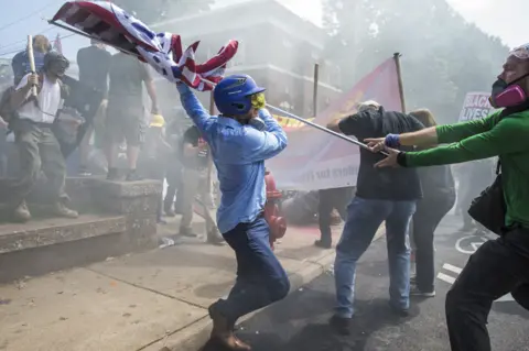 Getty Images White supremacists clash with counter-protesters