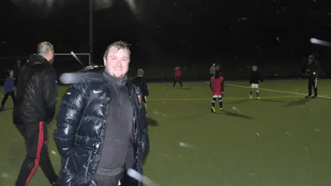 Andrew Woodger/BBC Sam Nunn at a Holbrook Hornets coaching session on the artificial pitch at the Royal Hospital School