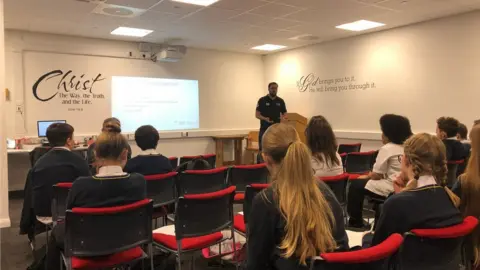 EYST Schoolchildren being taught in a classroom by the EYST Resilience team