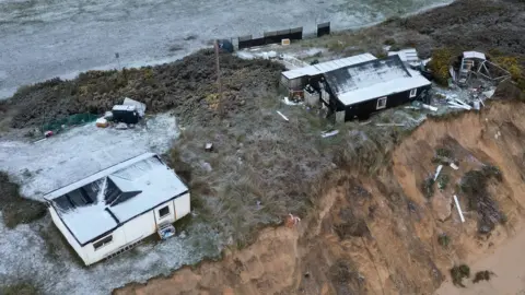 Martin Barber/BBC Properties on the eroded dunes at Hemsby on the north side of the gap