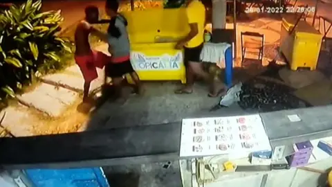 Rio police handout via AFP Screengrab of the video showing the Congolese man being beaten up