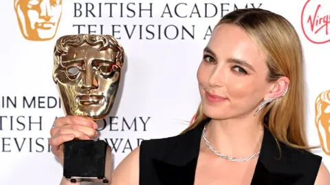 Leading Actress Award winner, Jodie Comer poses in the winners room at the Virgin Media British Academy Television Awards at The Royal Festival Hall on 8 May 2022