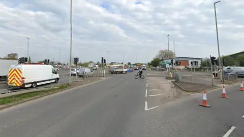 Google A wide shot of traffic at the junction of the A38 and Cole Avenue in Gloucester