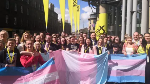 Hannah Bardell / Twitter SNP MPs and trans activists outside conference