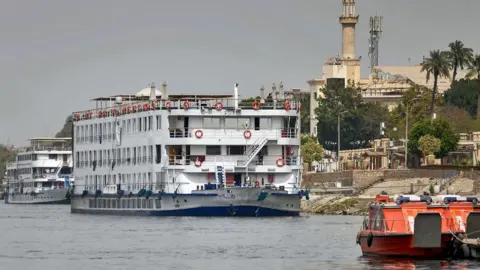 AFP The Nile cruise ship A Sara moored in the city of Luxor, Egypt (9 March 2020)
