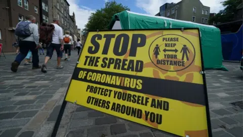 PA Media Covid street sign