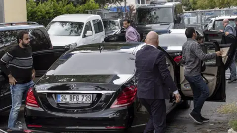 EPA Saudi officials arrive at Saudi consulate in Istanbul, Turkey, 12 October 2018.