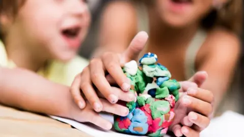 Getty Images Children play with modelling clay