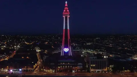Friends of BAPS Preston Blackpool Tower lit in red and white stripes