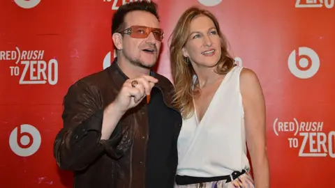 Getty Images Deborah Dugan and Bono