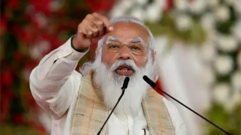 Reuters India's Prime Minister Narendra Modi addresses a gathering in Ahmedabad, India (March 12, 2021)