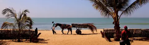 Corbis/Getty Images A beach in Senegal