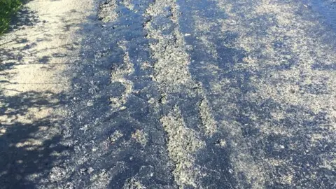 Ian Torley Tyre prints in melting tarmac