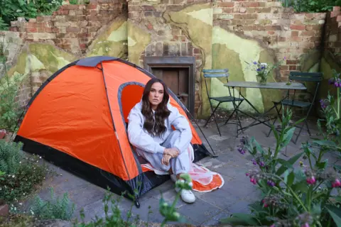 Getty Images Vicky Pattison sleeps out at the Chelsea Flower Show for Centrepoint to raise awareness about youth homelessness in the UK, on May 21, 2023 in London, England.