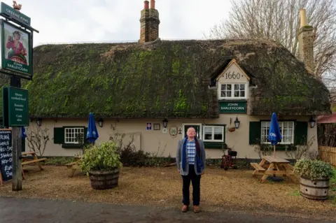 Mike Priestley at his favourite pub in the village, the John Barleycorn