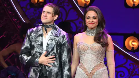 Getty Images Aaron Tveit and Karen Olivo