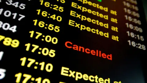 Getty Images Airline departure board