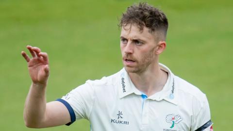 Ben Coad prepares to bowl for Yorkshire