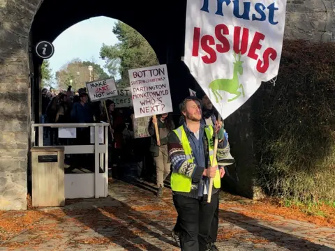 Campaigners marching at Dartington