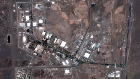 Maxar Technologies/EPA A handout satellite image made available shows Iran's Natanz nuclear enrichment facility after US air strikes, in Natanz, Iran, 22 June 2025. 