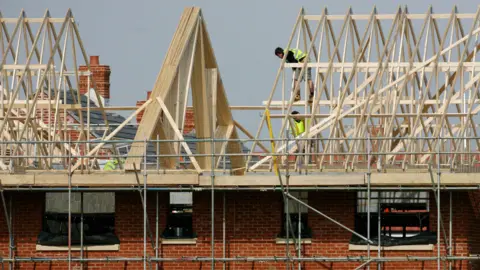 PA Media Builders at work on new homes.