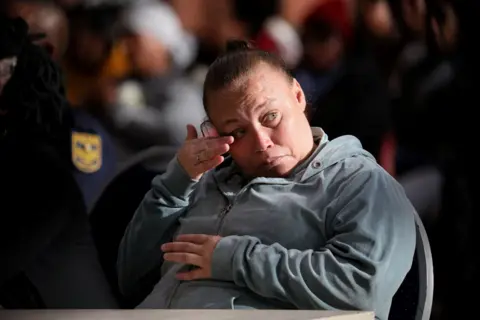SUMAYA HISHAM / REUTERS Kelly Smith, the mother of Joshlin Smith, wipes the corner of her eye during her sentencing at the Western Cape High Court in Saldanha Bay.
