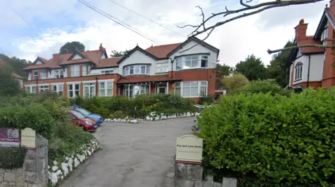 Plas Isaf Home in Llannerch Road West, Rhos-on-Sea from the entrance