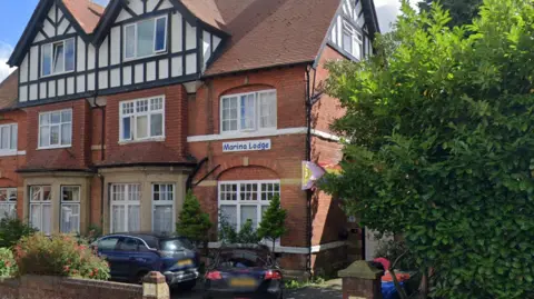 Large Victorian house with large bay windows