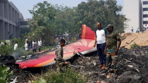 Aircraft debris at the crash site of Air India Ltd. flight AI171 in Ahmedabad, Gujarat, India, on Thursday, June 12, 2025. An Air India Boeing 787 Dreamliner traveling from Ahmedabad to London's Gatwick airport crashed shortly after taking off, in what stands to be the most serious accident involving the US planemaker's most advanced wide-body airliner.