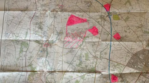 A map with pink blobs, showing where all the big developments will be.