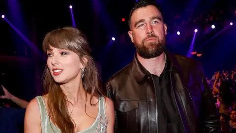 Getty Images Taylor Swift and Travis Kelce at the 2026 iHeartRadio Music Awards held at Dolby Theatre on March 26, 2026 in Los Angeles,