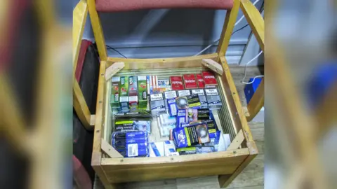 Humberside Police Tobacco and vapes hidden in the seat of a chair